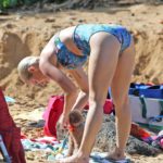 Katy Perry & Orlando Bloom Sunbathing On A Beach